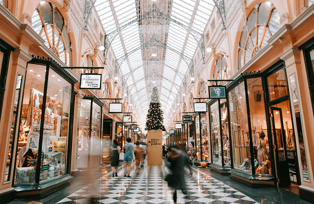 Holiday shoppers walk the mall.